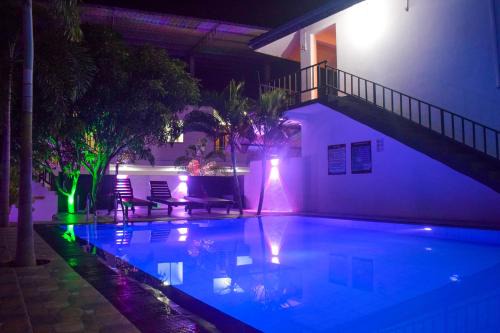 New Town Hotel | Affordable Stays at Lion Resort with Pool & Breakfast