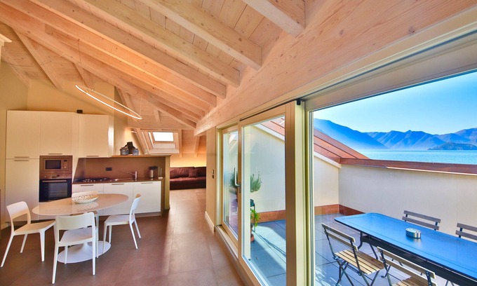 Bellagio Apartment | Elegant LISZT ATTIC: Oceanfront Getaway with Breakfast