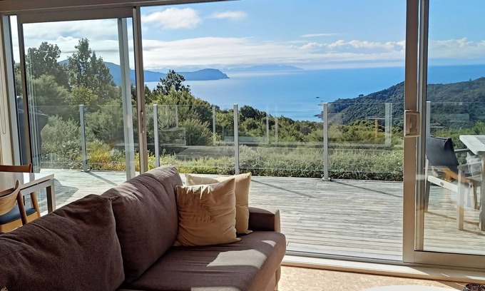 Waikawau House | Eco-Friendly Little Bay House with Oceanview & Pool Access