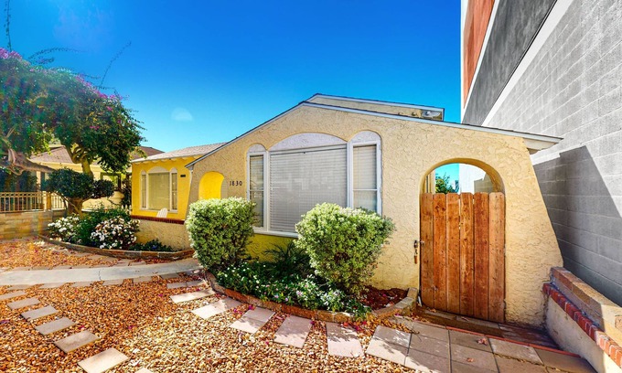 Little Italy House | Little Italy Charmer Spanish-style home in the heart of Little Italy with 3 patios, garden & parking