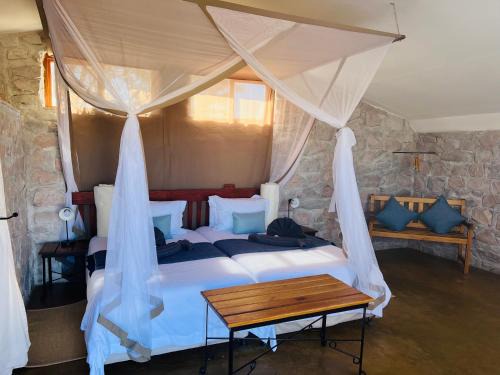 Sesriem Hotel | Discover Little Sossus Lodge: Oceanfront Escape with Pool