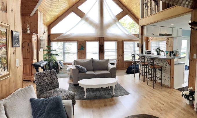 Chippewa Lake House | Charming Little White Cottage by Chippewa Lake with Views