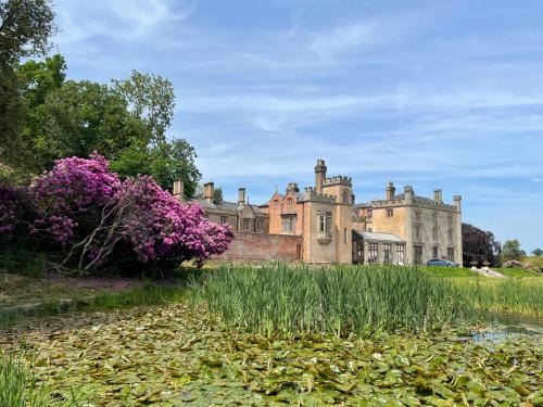 Kingswood House | Relax at Llanerchydol Hall Suites: Pet-Friendly Retreat
