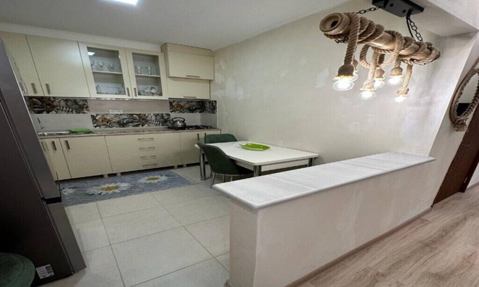 Kutaisi Apartment | Ideal City-Center Hotel Near University with Family Amenities