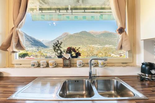 Valtellina Apartment | Location piano terra con giardino privato
