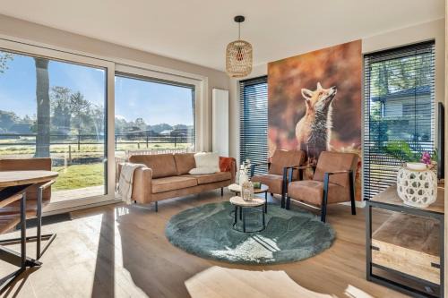 Krachtighuizen Ski Chalet | 'Lodge de Vos' luxe en vrijstaande lodge bij het Speulder- en Spielderbos