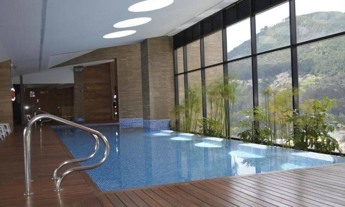 Centro International Apartment | Experience Loft Cool in Equilibrium with Spa and Pool Access