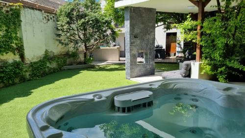 Ujlak Villa | Relax in Loft Garden Villa: 4BR, Family-Friendly Oasis