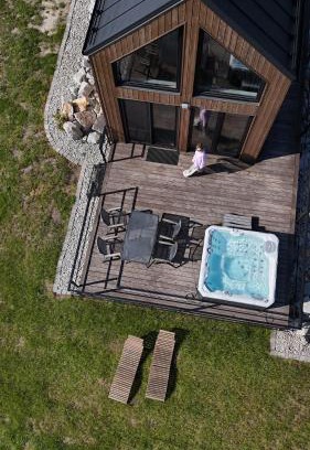 Marciszow House | Experience Loft Point 1: Family-Friendly with Hot Tub & High Rating