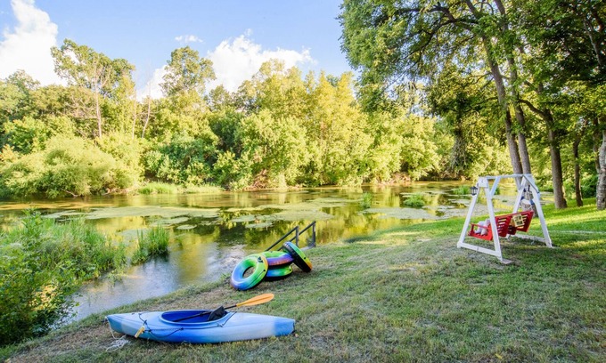 Seguin Cabin | Experience the Log Cabin on Guadalupe River with Kayaks!