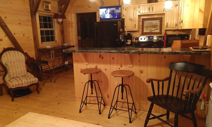 Mills River Cabin | Cozy Log Cabin Retreat with Spa and Mountain Views