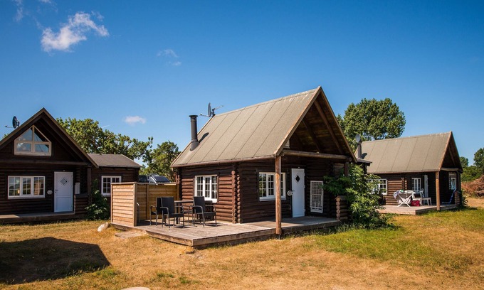 Sønderstrand Cabin | Cozy Log Cabin Retreat with Horse Stables by the Sea