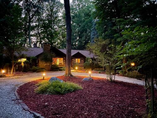 Richmond Heights House | Cozy Log Cabin Retreat with Fire Pit & Gazebo Awaits