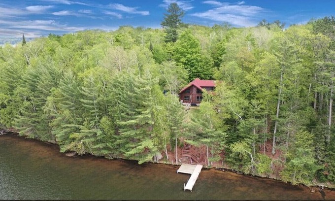 St Germain House | Secluded Log Cabin Retreat on Serene Lakefront Property