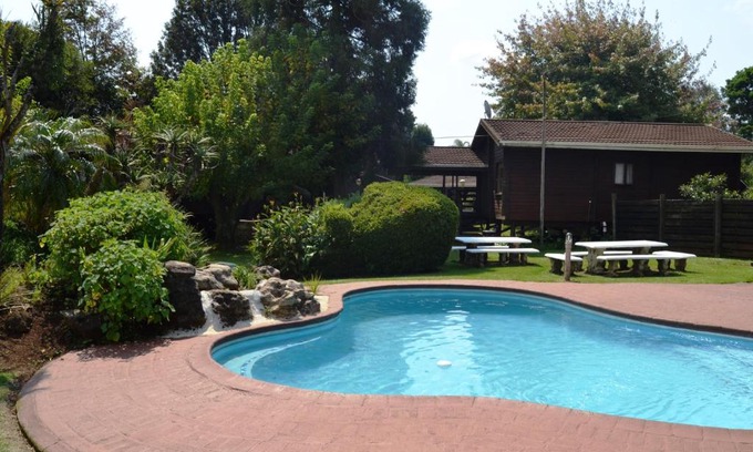 Graskop Resort | Cozy Log Cabin & Settlers Village with Pool and Hot Tub