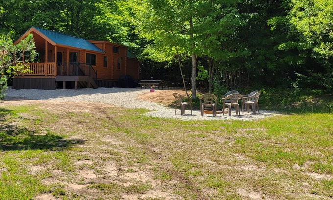 Northeast Michigan Cabin | Idyllic Log Cabin Tiny Home Retreat with Ocean Views