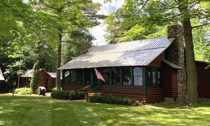 Northport Cottage | Charming Log Cottage with Beach Access & Downtown Proximity