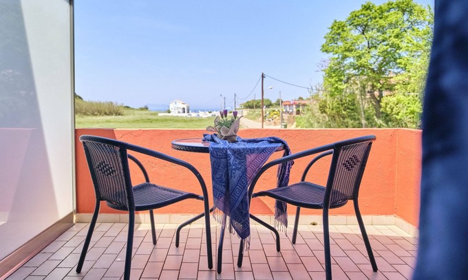 Peroulades Apartment | Inviting Logas Beach Studio 9: Ocean View & Spa Amenities