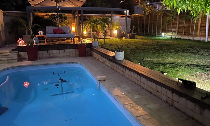 Les Abymes Condo | Inviting Stay in the Heart of the Island with Pool Access