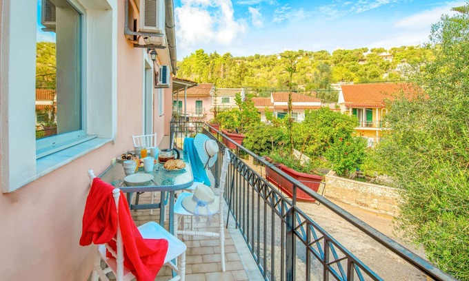Longos Apartment | Loggos Haven: Upper-Floor Retreat with Ocean Views