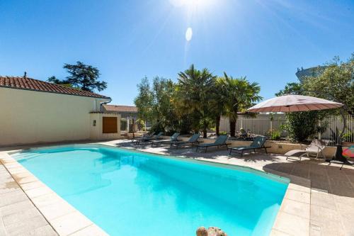 Cognac Hotel | Discover Logis Hôtel L'Oliveraie: Pool, Dining & Pets Welcome