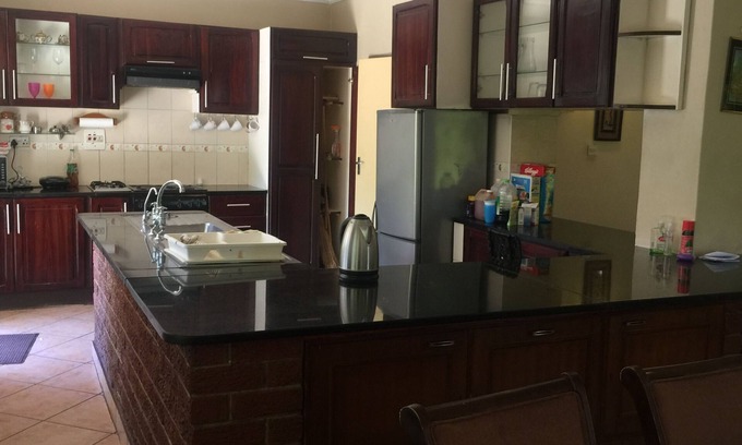 Harare House | Inviting Logo House Accommodations with Pool & Kitchen