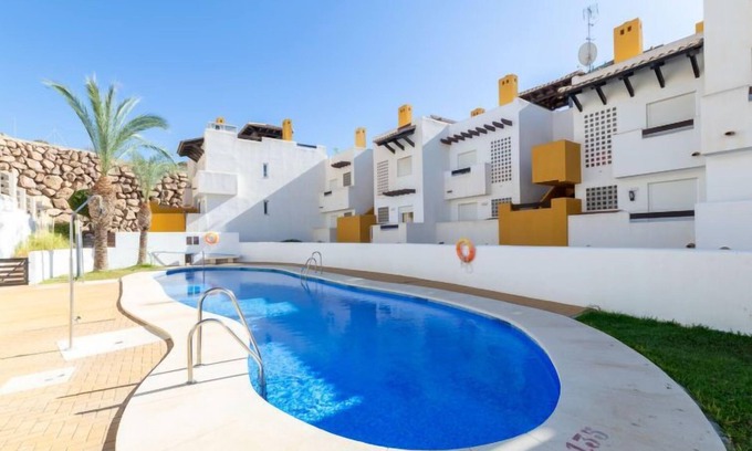 Vera Apartment | Beachfront Retreat at Lomas del Mar V by Interhome