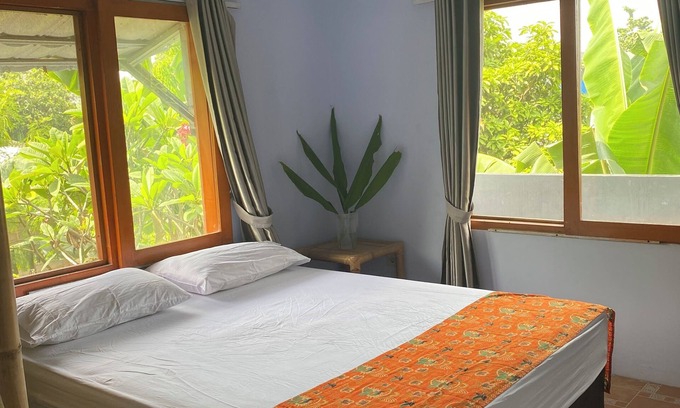 Mataram House | Lombok 3 bedroom tropical house with terrace. Beautiful mountain views.
