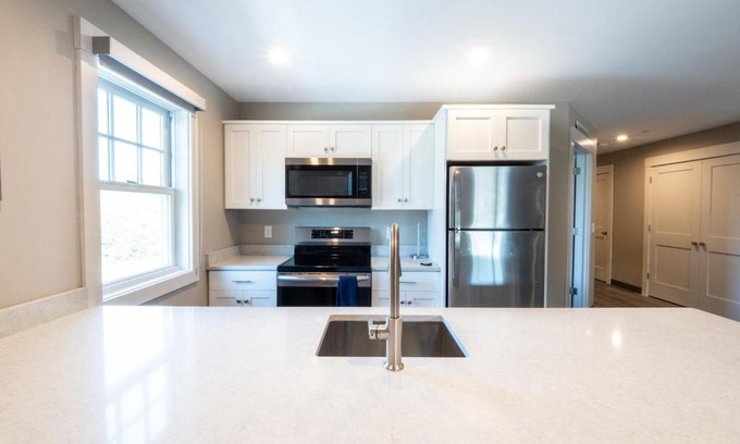 Gloucester Hotel | Discover Long Beach Suites - Family-Friendly Retreat Rated 9/10