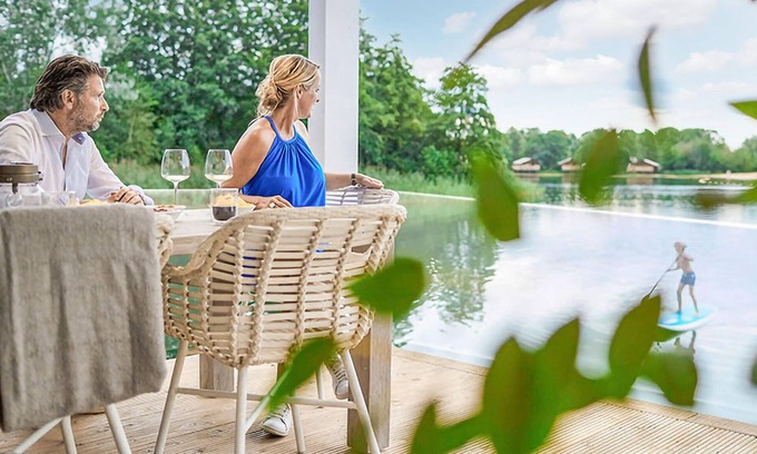 Maasbree House | Looking for a relaxing getaway close to the water? Then this vacation home located directly on a lak
