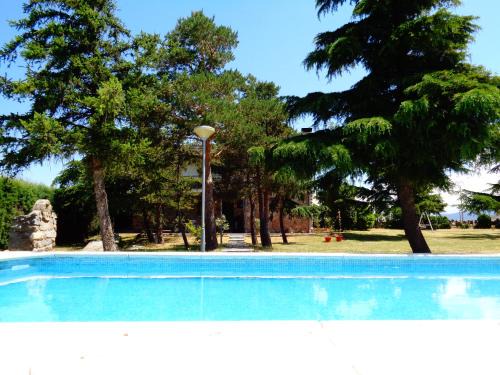 Otero de Herreros House | Discover Los Acebos: Pet-Friendly Hotel with Pool