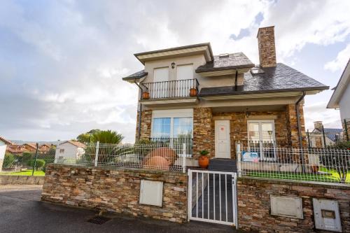 Hinojedo House | Discover Family-Friendly Comfort at Los Cuetos Hotel