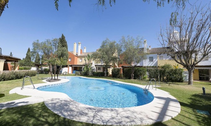 El Puerto de Santa Maria Ski Chalet | Explore Los Jandalos: A 4-Star Retreat with Pool Access