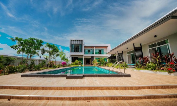 Buriram House | Relax at Lotus Lake View: Family-Friendly with Pool Access