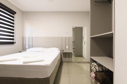 Guarapuava Apartment | Lou Suítes - Suíte 13 - Simples, Confortável e Perfeito