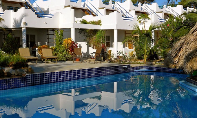 Sittee River Villa | Relax by the Pool or Enjoy Ocean Views at Our Hotel