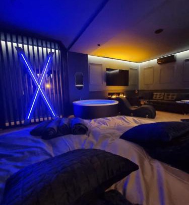 City-Centre - Petite France Apartment | Romantic Love Room with Inviting Hot Tub & High Ratings