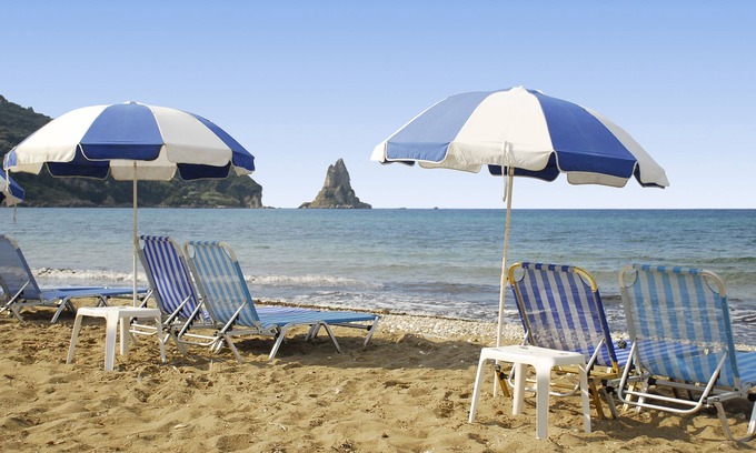 Agios Gordios Cottage | Charming 2-Bedroom Cottage Steps from the Beach with Pool