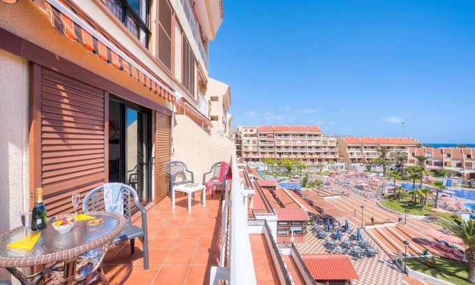 Arona Apartment | Prime 2-Bedroom Apartment Steps from the Beach, Rated 10/10