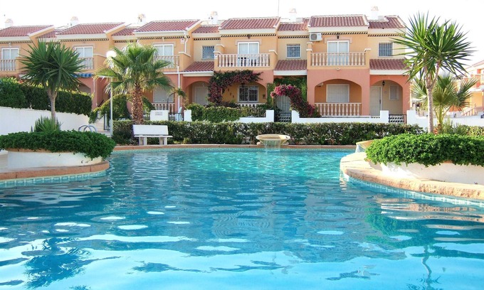 Quesada House | Lovely 3 bed townhouse with community pools & garden area on Dona Pepa, Quesada.