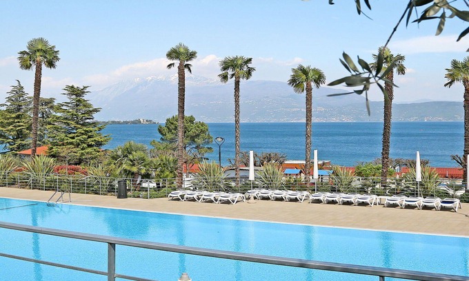 Villaggio Sanghen Apartment | Cozy Apartment for 4 with Pool, A/C, and Pet-Friendly Perks