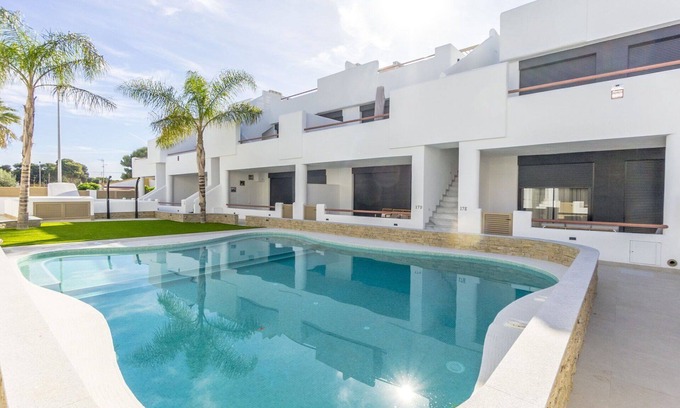 Santiago de la Ribera Apartment | Inviting Apartment for 6 with Pool, Terrace & Ocean View