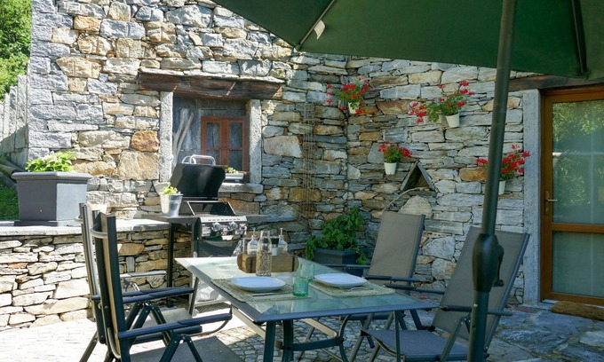 Malvaglia-dagro Apartment | Inviting Apartment for 3 with WIFI, Patio, and Parking
