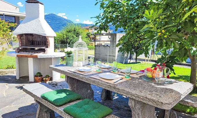 Gordola Apartment | Lovely apartment for 2 guests with A/C, WIFI, TV, patio, pets allowed, panoramic view and parking