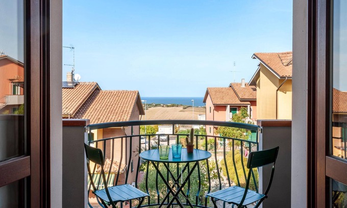 San Costanzo Apartment | Bright Family Apartment with Sea View and Pet-Friendly Amenities