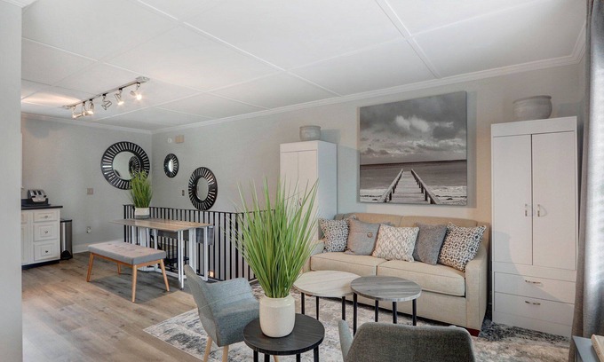 Hitch Village - Fred Wessels Homes Apartment | Charming Carriage House in Downtown with Heated Pool Access