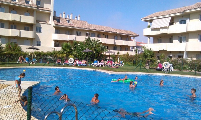 Puerto de la Duquesa Apartment | Charming Flat with Pools, Beach Access & Ocean View in Manilva