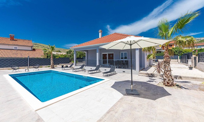 Plano House | Inviting Vacation Home with Pool and Ocean Views