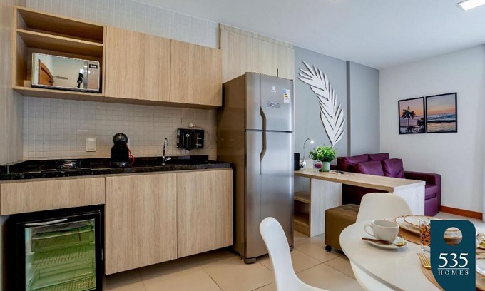 Caminho das Arvores Apartment | Linda Suite with Kitchenette in Central Location, Rated 10/10