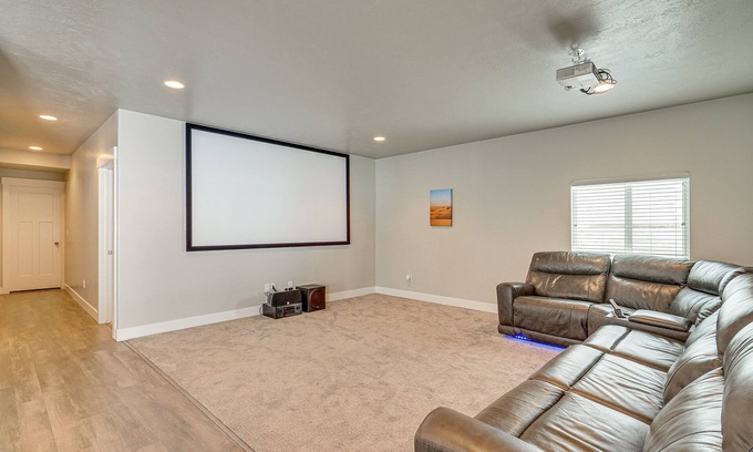 South Jordan Apartment | Inviting Walk-Out Apartment with Movie Screen Near SLC